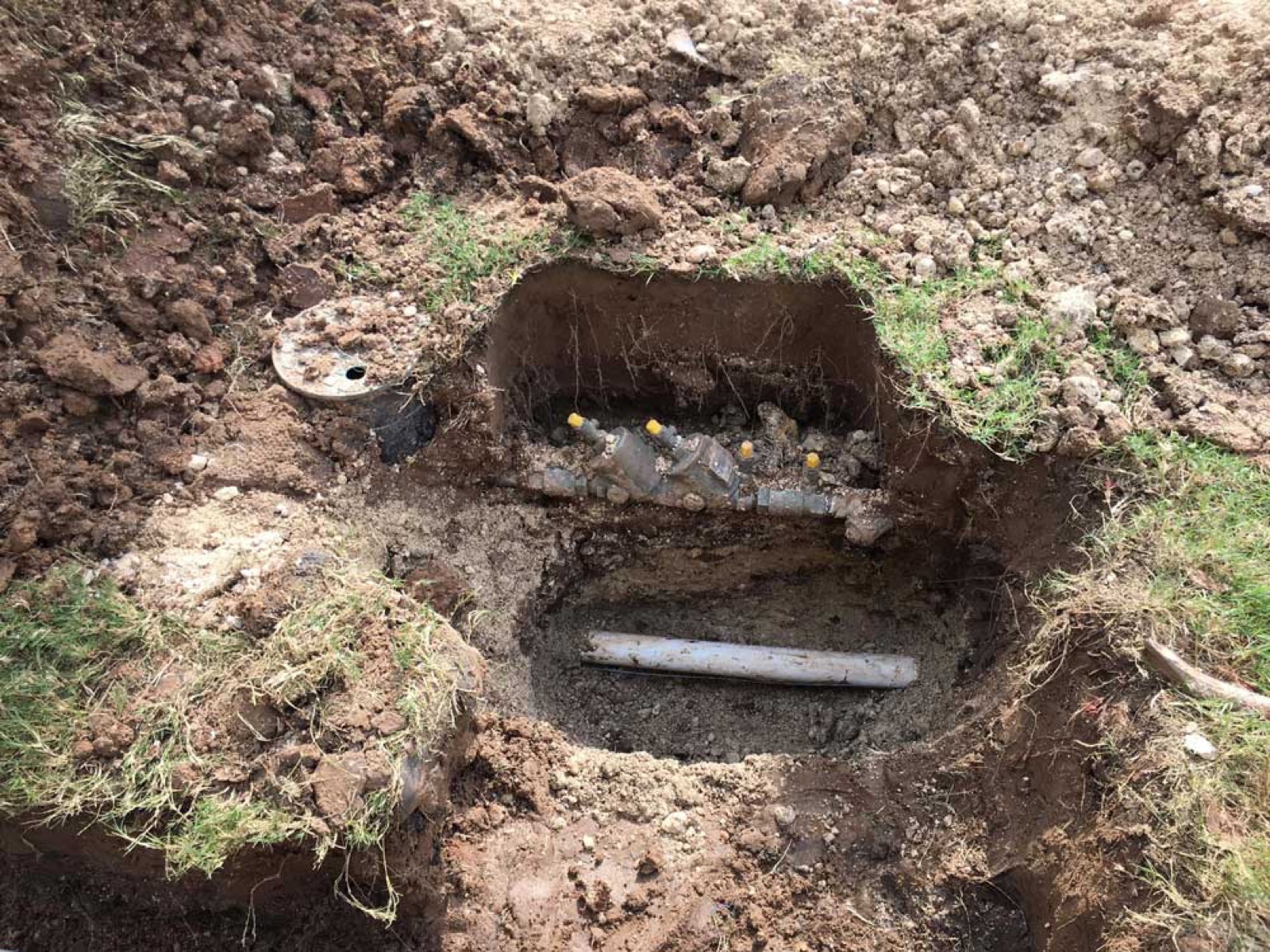 Excavated broken water line during leak repair in Hutto, TX